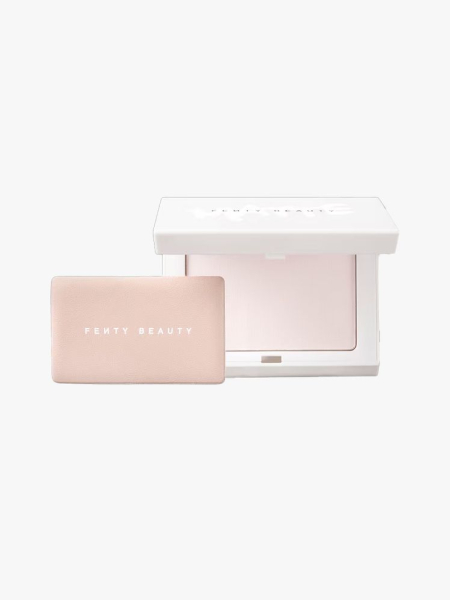 Fenty Beauty Invisimatte Instant Setting + Blotting Powder in branded component on a light gray background